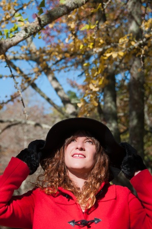 Woman enjoying a sunny autumn dayの写真素材