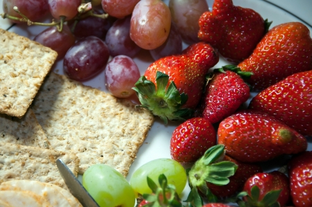 Plate of crackers and fruitsの写真素材