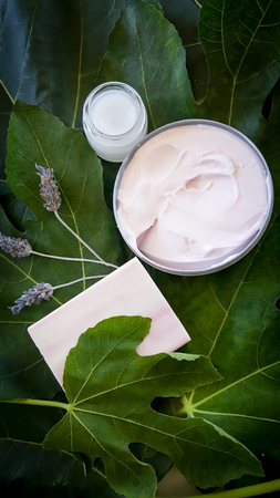 Lavender creams at a spa retreat with soapの写真素材
