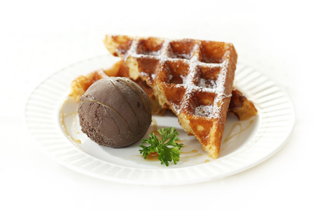  ice cream scoop decorated with waffle and caramel sauceの写真素材