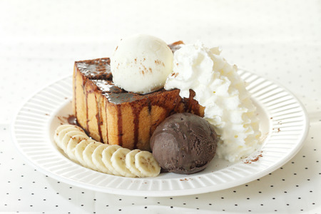 ice cream and toasted bread with bananaの写真素材