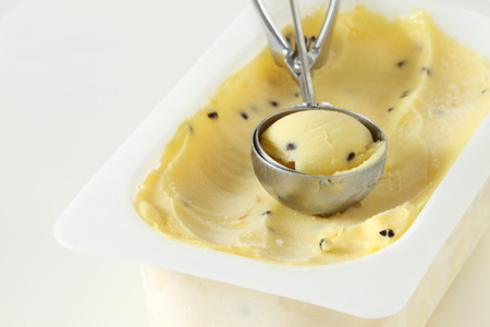 ice cream in a tray container on white backgroundの写真素材
