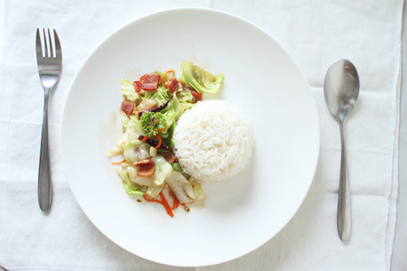 rice with fried cabbage with baconの写真素材