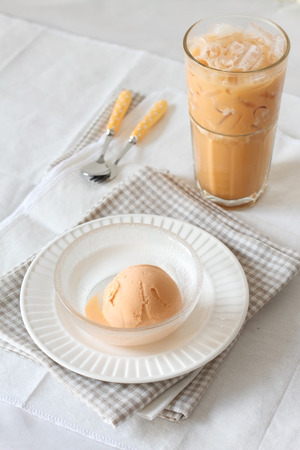 ice cream scoop with milk teaの写真素材