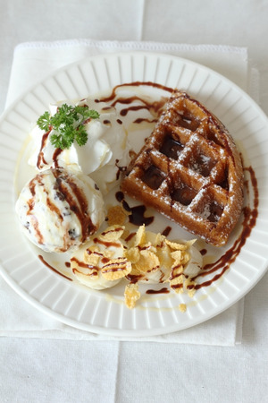 ice cream with waffle on white backgroundの写真素材