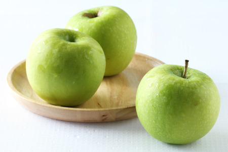 fresh green apple on white backgroundの写真素材