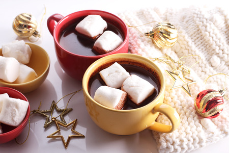 hot chocolate drink with celebration decorations on white backgroundの写真素材