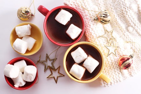 hot chocolate drink with celebration decorations on white backgroundの写真素材