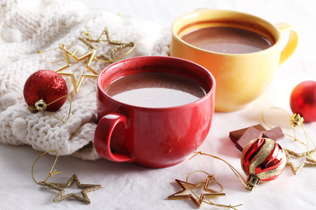 hot chocolate drink with celebration decorations on white backgroundの写真素材