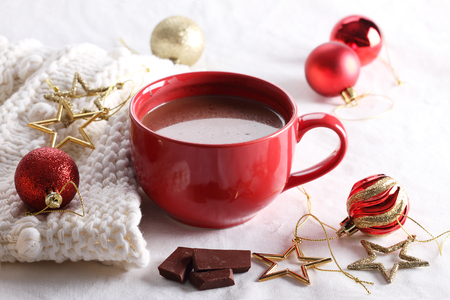 hot chocolate drink with celebration decorations on white backgroundの写真素材