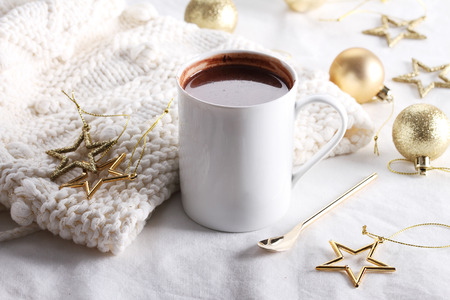 hot chocolate drink with celebration decorations on white backgroundの写真素材