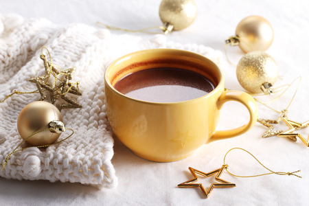 hot chocolate drink with celebration decorations on white backgroundの写真素材