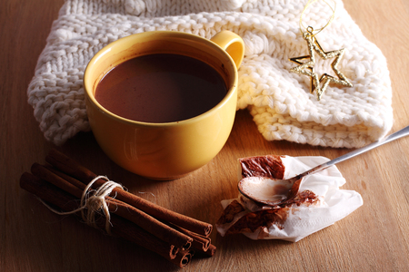 hot chocolate drink in yellow mug on white backgroundの写真素材