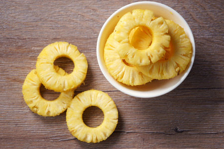 pineapple. fresh pineapple on wooden backgroundの写真素材