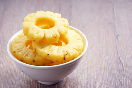 pineapple. fresh pineapple on wooden backgroundの写真素材