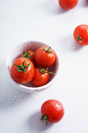 Tomatoes. red ripe tomatoes on white background.の写真素材