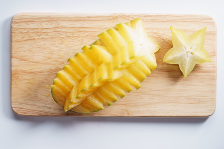 Star fruit, starfruit, carambola on wooden backgroundの写真素材