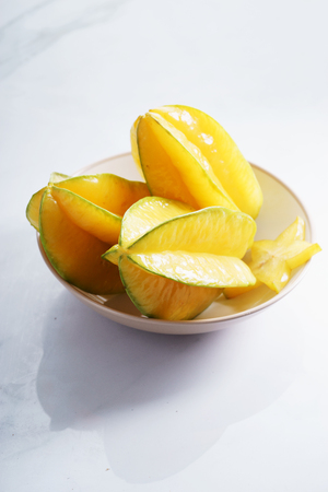 Star fruit, starfruit, carambola on white backgroundの写真素材