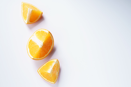 citrus fruits slices. Oranges. On white marble tableの写真素材