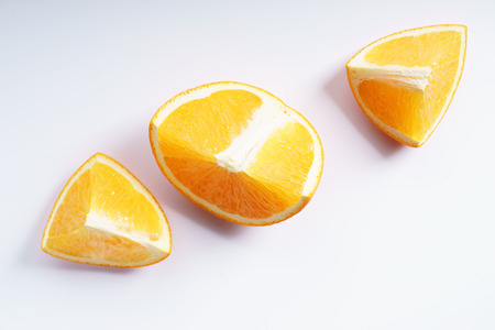 citrus fruits slices. Oranges. On white marble tableの写真素材