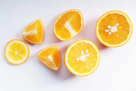 citrus fruits slices. Oranges. On white marble tableの写真素材