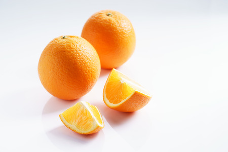 citrus fruits slices. Oranges. On white marble tableの写真素材