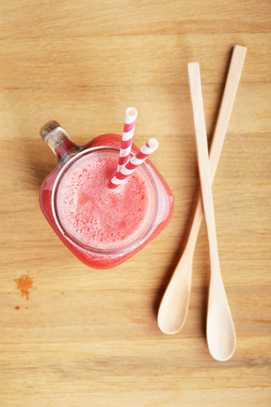 Healthy watermelon drink  on wooden backgroundの写真素材