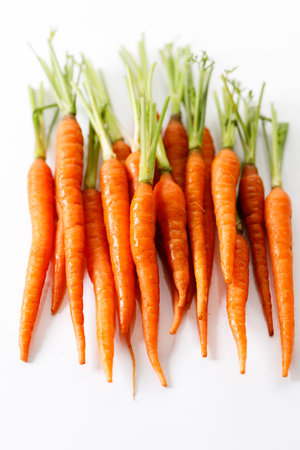 Fresh and sweet ripe orange carrot on white backgroundの写真素材