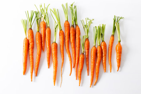 Fresh and sweet ripe orange carrot on white backgroundの写真素材