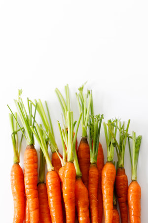 Fresh and sweet ripe orange carrot on white backgroundの写真素材