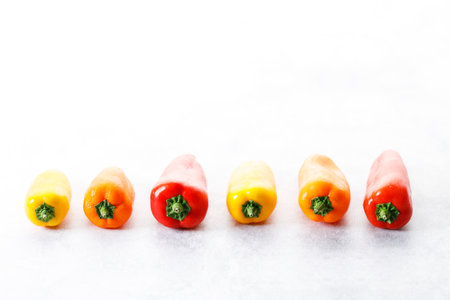 Colorful Sweet Pepper Chili, Baby Small Bell Pepper on white backgroundの写真素材
