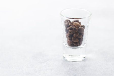 Aromatic flavorful Roasted Specialty Coffee Beans on white Backgroundの写真素材