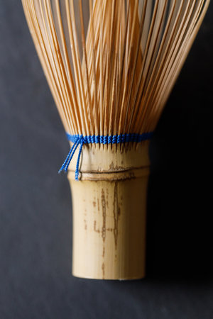 Closeup of Chasen or Bamboo whisk, an equipment for preparing matcha green tea. Selective focus.の写真素材