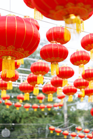 Lunar or Chinese new year lanterns decorated around ancient temple, Thailand.の写真素材