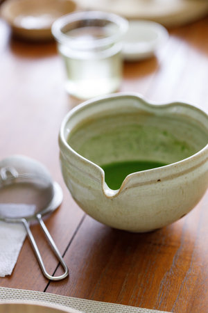 Closeup of fresh matcha tea froth, green tea. Selective focus.の写真素材