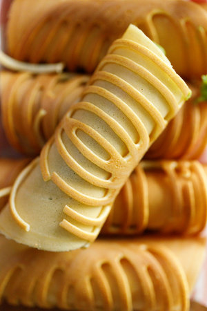 Stack of pancake roll filled with assorted filling. Selective focus.の写真素材