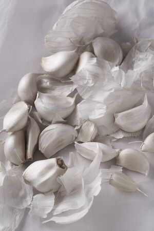 Garlic cloves on white close upの写真素材