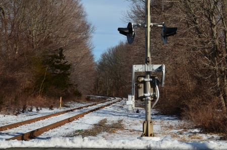 Railroad tracks and safety lightsの写真素材