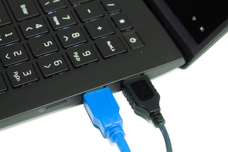 Cables and wires connected to the computer. Internet network cables connected to laptop. Internet...