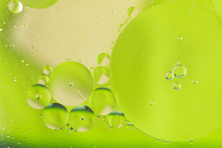 Abstract background, air bubbles in water close-up. Macro photo of water and oil. Strange...