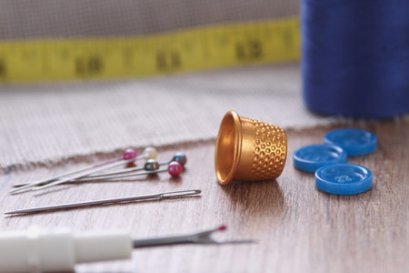 Needle thread, side view. Copy space. Background for creators. Sewing fittings. Side view, close up,...
