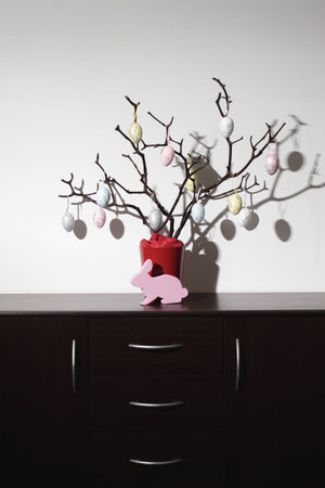 Decoration of eggs and rabbit, for Holy Easter. Concept of the holiday of Bright Easter. Copy space