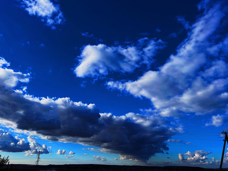 blue sky background with clouds and power lines, beautiful photo digital picture