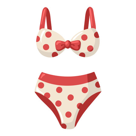 Cartoon bikini swimsuit in red polka dot style with bow. Vector isolated illustration on white background.のイラスト素材