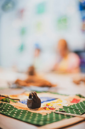 ceramic houses made of clay are on the table