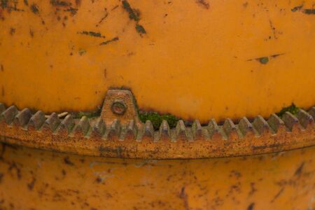 Close up of cogs or teeth on an old cement mixerの写真素材