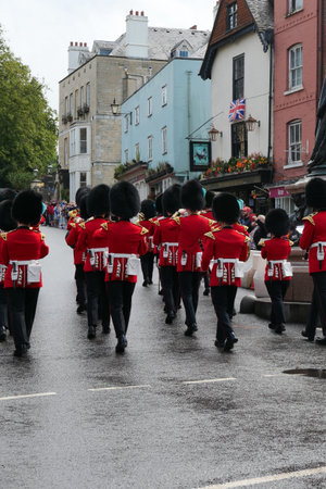 7 August 2021 - Windsor UK: Rear view of soldiers marching in uniform