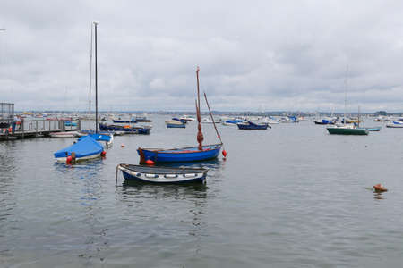 10 September 2021 - Poole, UK: View of sailing boats docked in bayのeditorial素材