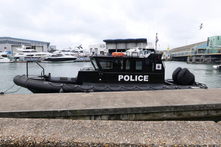 10 September 2021 - Poole UK: Police vessel alongside in harbourのeditorial素材