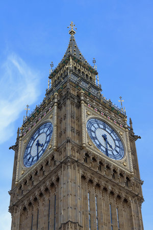 11 September 2022 - London UK: Vertical image of Big Ben against blue autumn sky